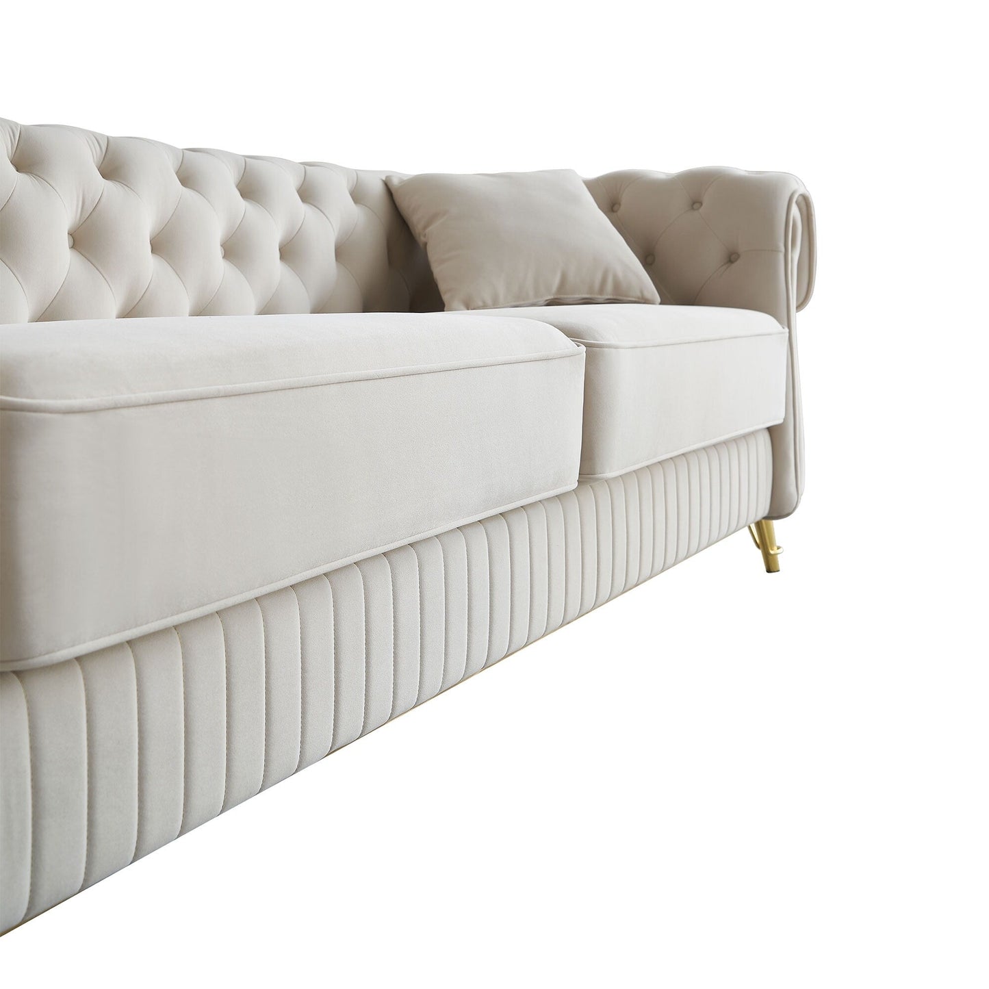 Canapé 3 places en velours 89 avec deux coussins d'assise et deux coussins décoratifs.