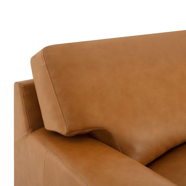Canapé moderne en cuir véritable avec pieds en bois et coussin supplémentaire.