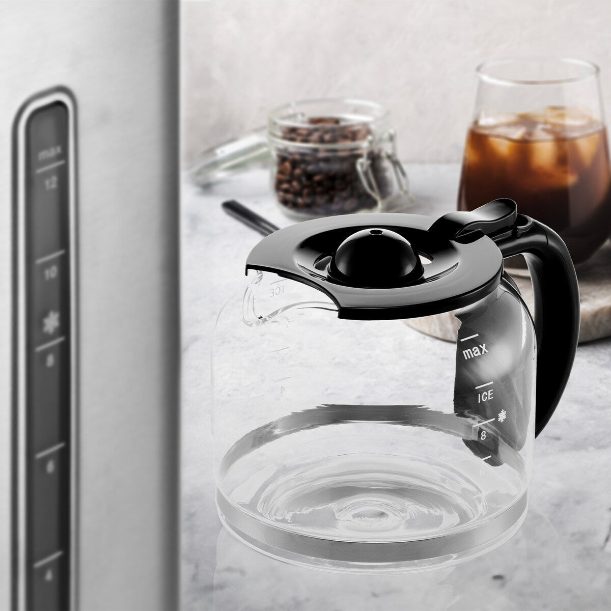 Machine à café goutte-à-goutte Melitta Aroma Tocco Plus, 12 tasses, pour café chaud et glacé, avec carafe en verre et écran tactile.