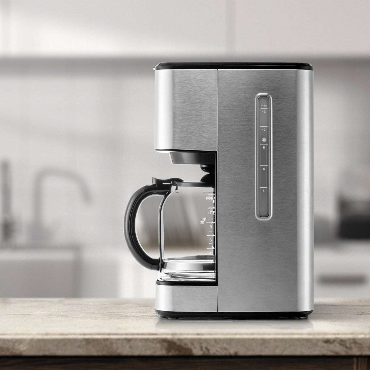 Machine à café goutte-à-goutte Melitta Aroma Tocco Plus, 12 tasses, pour café chaud et glacé, avec carafe en verre et écran tactile.