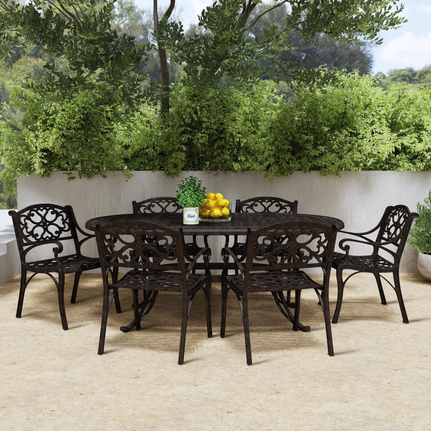 Ensemble de salle à manger d'extérieur Sanibel en bronze et aluminium, 7 pièces, comprenant une table ovale de 72 pouces et six chaises à accoudoirs de Homestyles.