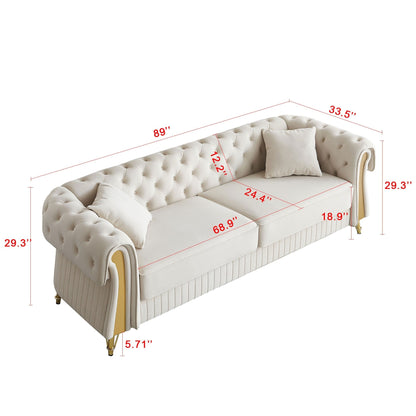 Canapé 3 places en velours 89 avec deux coussins d'assise et deux coussins décoratifs.