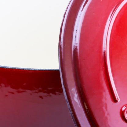 Poule à ragoût ronde en fonte de 7 quarts avec deux poignées, couleur rouge poivré, de la marque Craftsman.