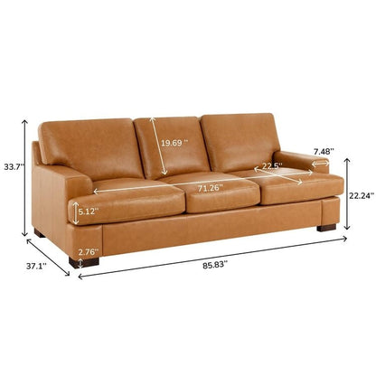 Canapé moderne en cuir véritable avec pieds en bois et coussin supplémentaire.