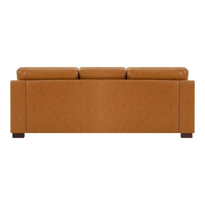 Canapé moderne en cuir véritable avec pieds en bois et coussin supplémentaire.