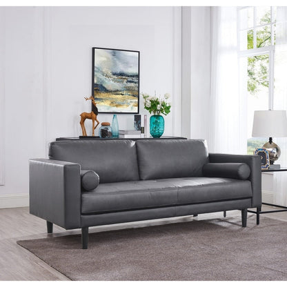 Canapé moderne en cuir véritable avec pieds en bois et coussin supplémentaire.