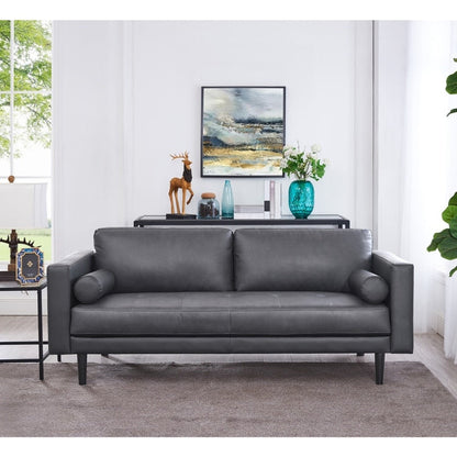 Canapé moderne en cuir véritable avec pieds en bois et coussin supplémentaire.