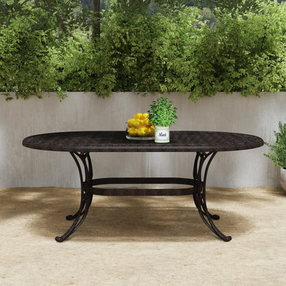 Ensemble de salle à manger d'extérieur Sanibel en bronze et aluminium, 7 pièces, comprenant une table ovale de 72 pouces et six chaises à accoudoirs de Homestyles.
