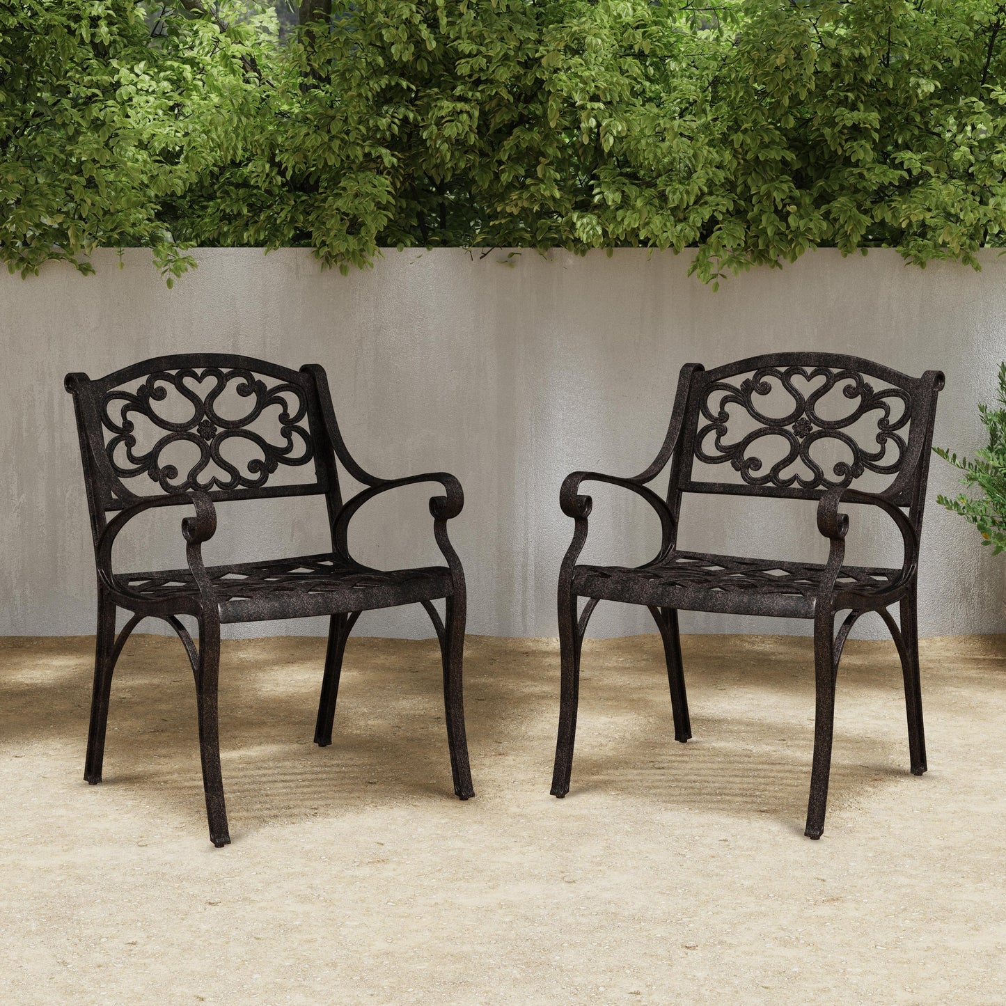 Ensemble de salle à manger d'extérieur Sanibel en bronze et aluminium, 7 pièces, comprenant une table ovale de 72 pouces et six chaises à accoudoirs de Homestyles.