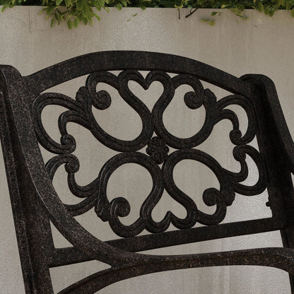 Ensemble de salle à manger d'extérieur Sanibel en bronze et aluminium, 7 pièces, comprenant une table ovale de 72 pouces et six chaises à accoudoirs de Homestyles.