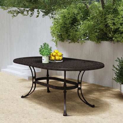 Ensemble de salle à manger d'extérieur Sanibel en bronze et aluminium, 7 pièces, comprenant une table ovale de 72 pouces et six chaises à accoudoirs de Homestyles.