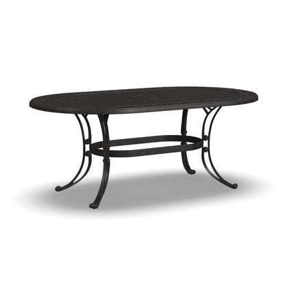 Ensemble de salle à manger d'extérieur Sanibel en bronze et aluminium, 7 pièces, comprenant une table ovale de 72 pouces et six chaises à accoudoirs de Homestyles.