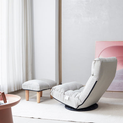 Ensemble de fauteuil inclinable sans accoudoirs, recouvert de tissu, avec repose-pieds et appuie-tête réglable.